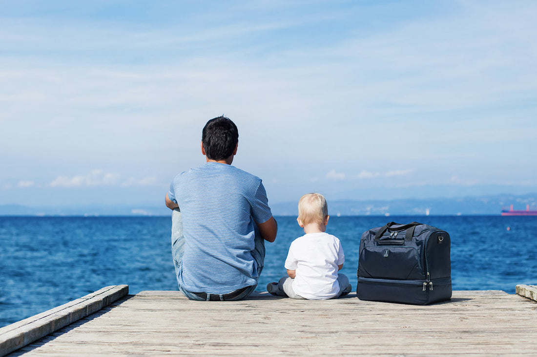 Father and infant son on holiday