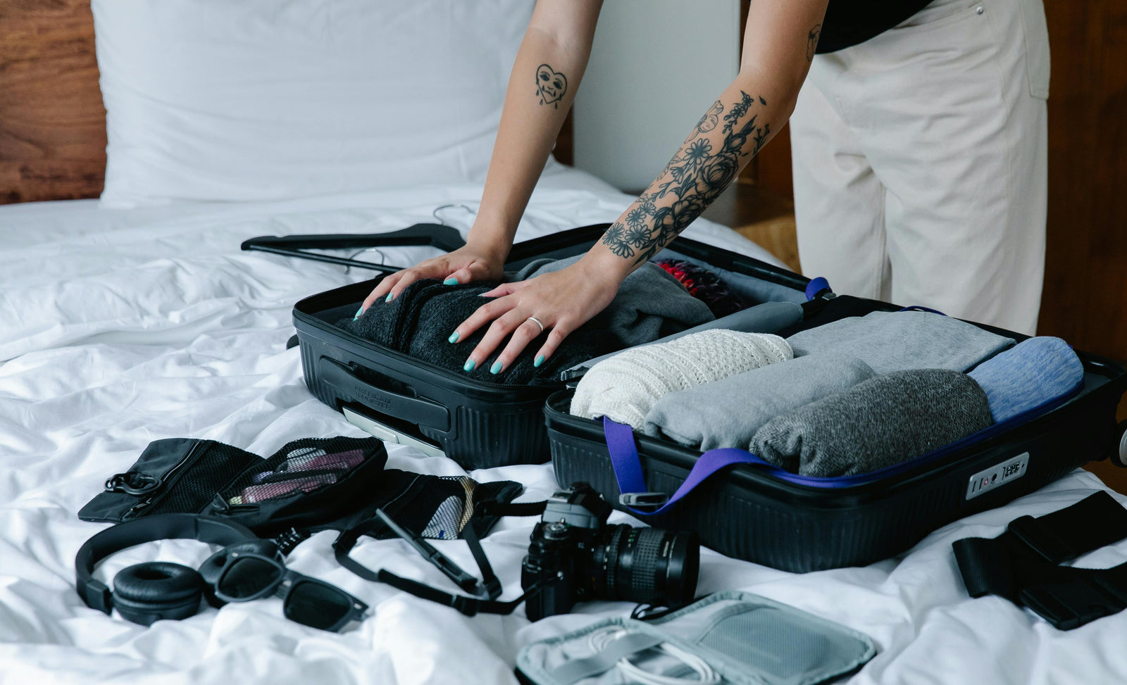 backpack or suitcase traveling to europe Travel Backpack: Through the Back Door Bag Black the shoulder straps securely tuck away in the back Two Months, Twelve Countries, One