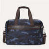Travelpro Platinum® Elite Soft Duffel bag in blue camo, featuring durable fabric, brown leather accents, multiple zippered compartments, and adjustable shoulder strap.