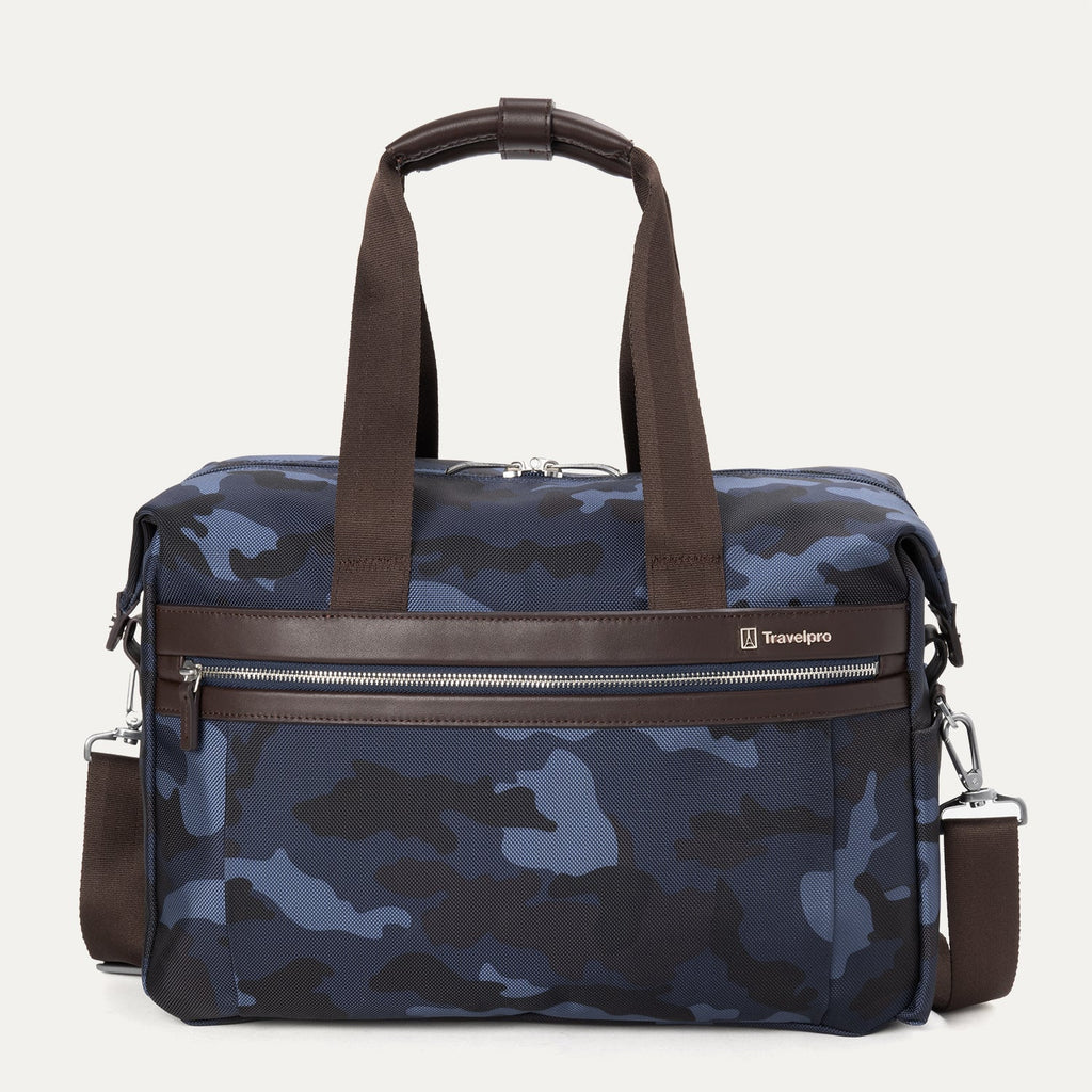 Travelpro Platinum® Elite Underseat Tote in blue camo, featuring durable fabric, brown leather accents, front zip pocket, and removable shoulder strap.