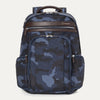 Travelpro Platinum® Elite Business Backpack in blue camo, featuring durable fabric, brown leather trim, multiple zippered compartments, and padded laptop sleeve