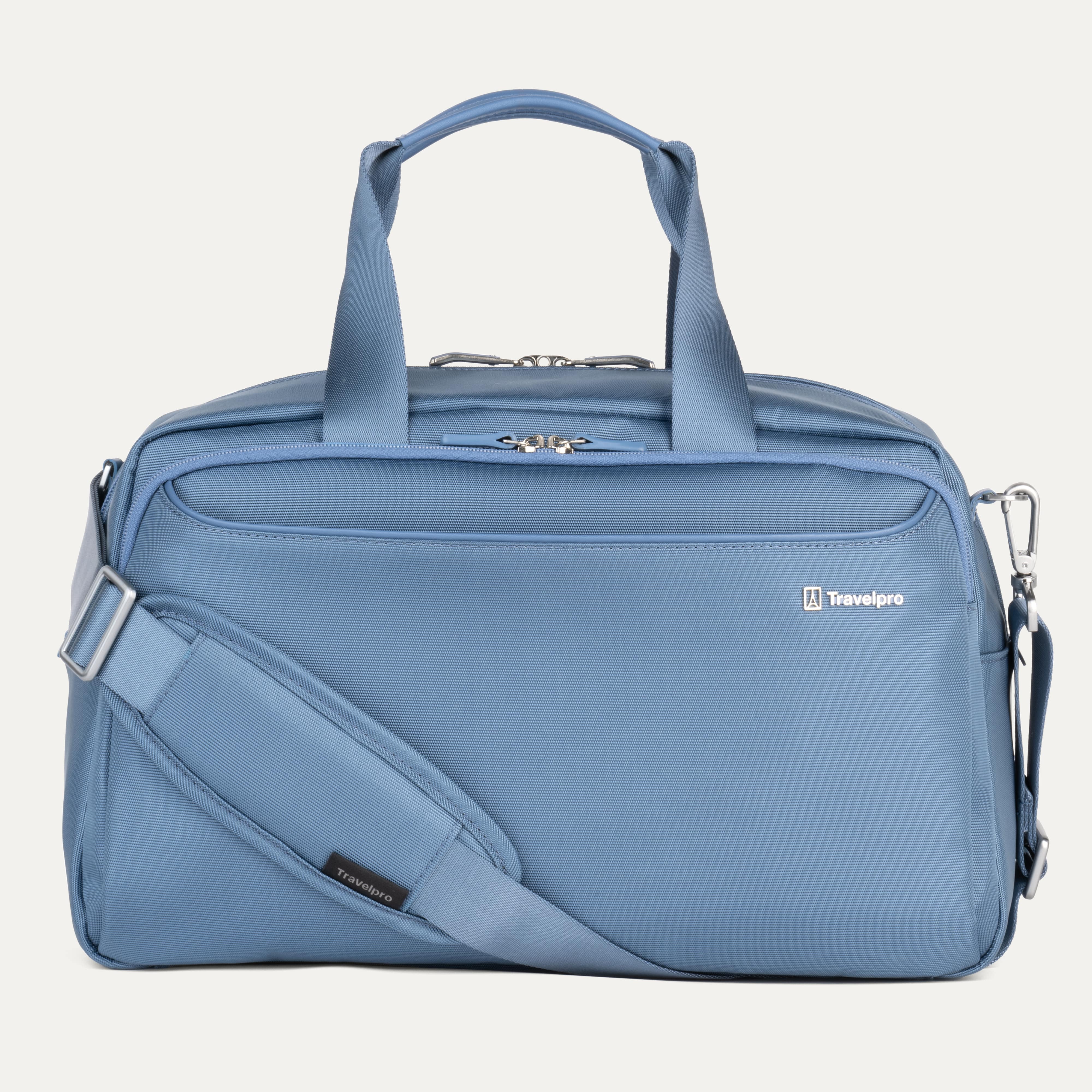 Travelpro VersaPack® Underseat Tote in Elemental Blue with adjustable shoulder strap, multiple compartments, and durable soft-shell design for carry-on travel.