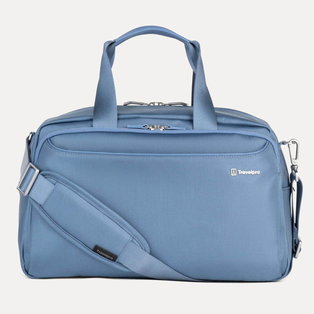 Travelpro VersaPack® Underseat Tote in Elemental Blue with adjustable shoulder strap, multiple compartments, and durable soft-shell design for carry-on travel.