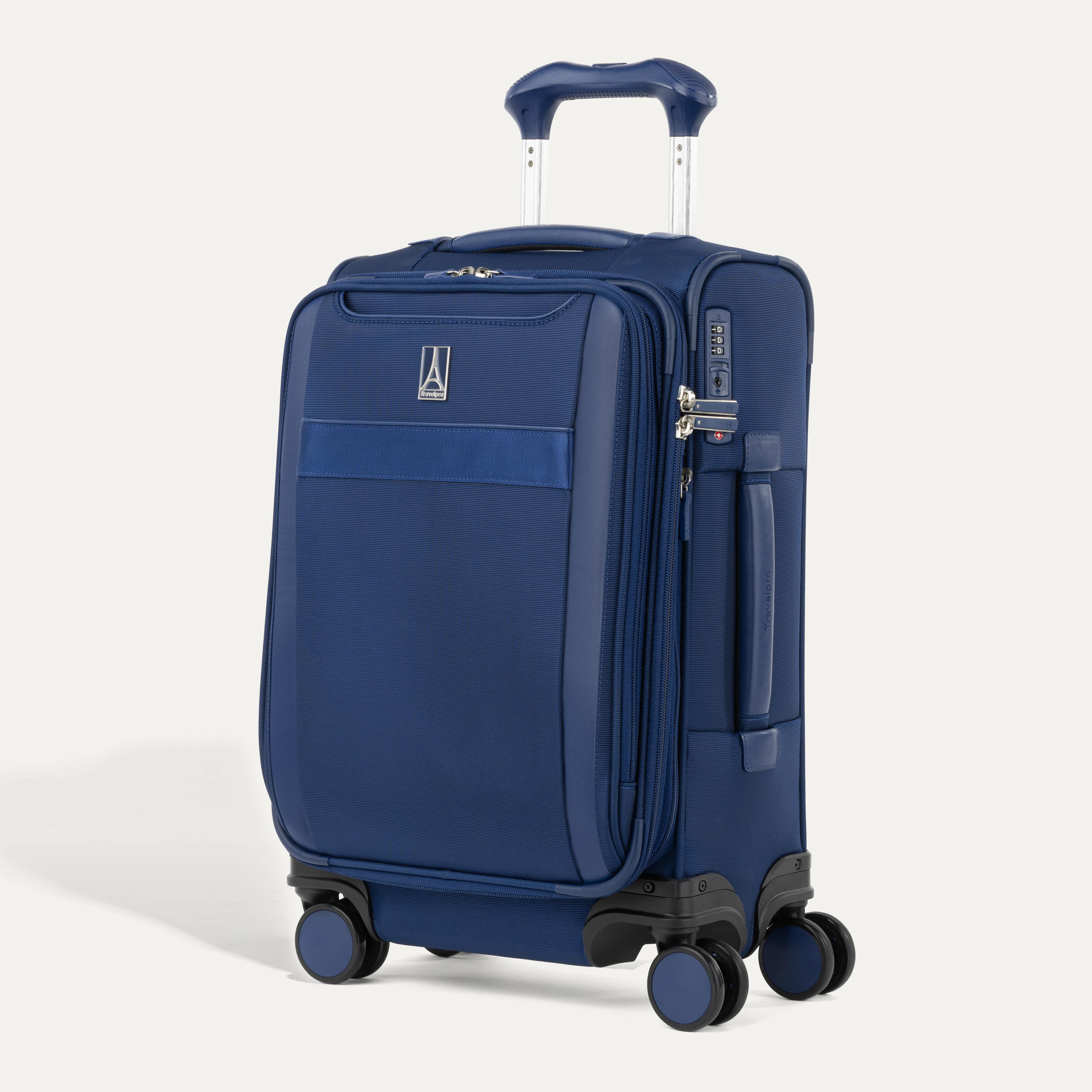 Travelpro VersaPack® Compact Carry-On Expandable Softside Spinner in Estate Blue, featuring four 360° wheels, lightweight design, and external front pocket.