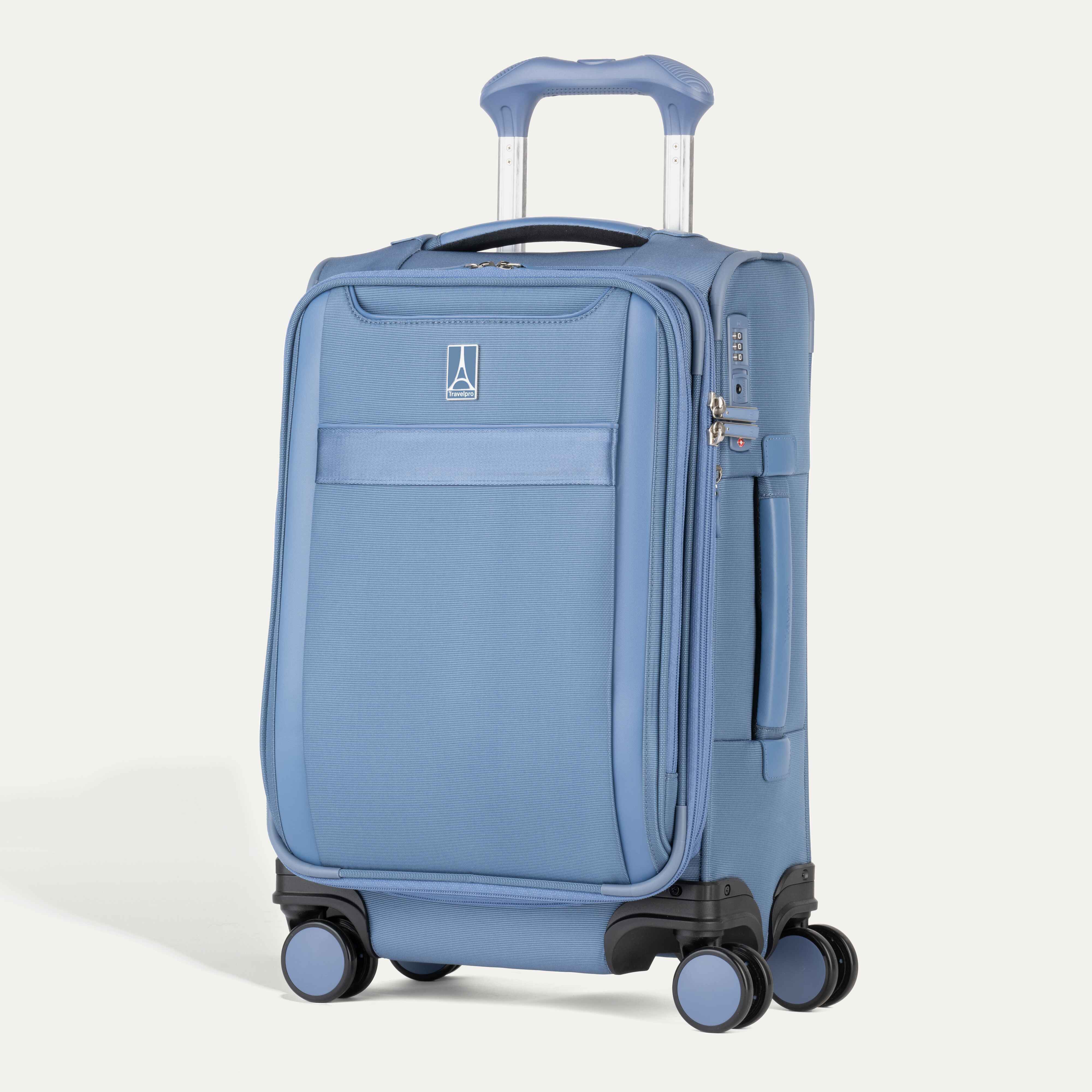 Travelpro VersaPack® Compact Carry-On Expandable Softside Spinner in Elemental Blue, featuring four 360° wheels, lightweight design, and external front pocket.