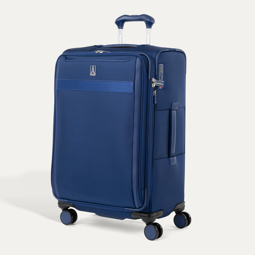 Travelpro VersaPack® Medium Check-In Expandable Softside Spinner suitcase in Estate Blue, featuring four 360° wheels, lightweight construction, and built-in TSA lock