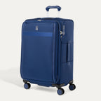 Travelpro VersaPack® Medium Check-In Expandable Softside Spinner suitcase in Estate Blue, featuring four 360° wheels, lightweight construction, and built-in TSA lock