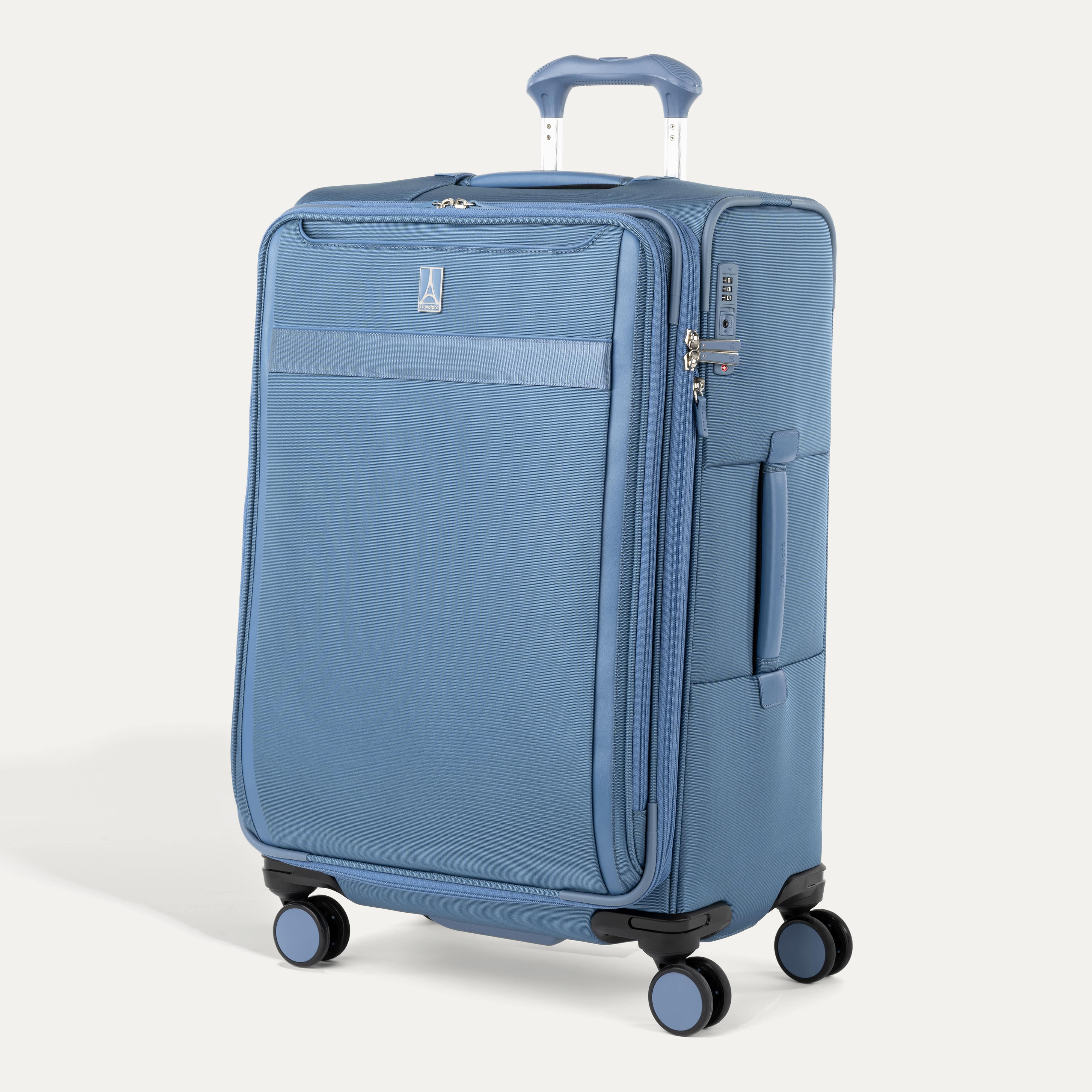 Travelpro VersaPack® Medium Check-In Expandable Softside Spinner suitcase in Elemental Blue, featuring four 360° wheels, lightweight construction, and built-in TSA lock