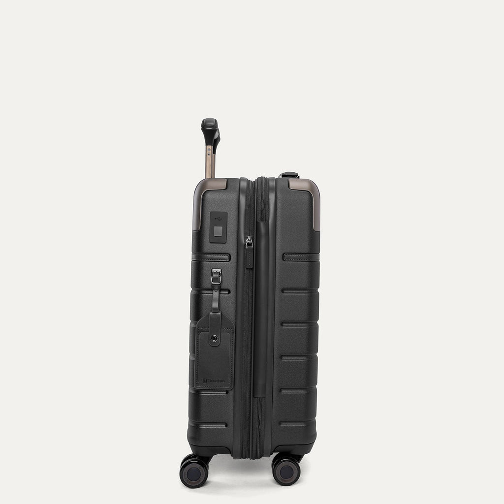 Side profile of the Travelpro Platinum Reserve Compact Cabin Hardshell Spinner in Black Dust