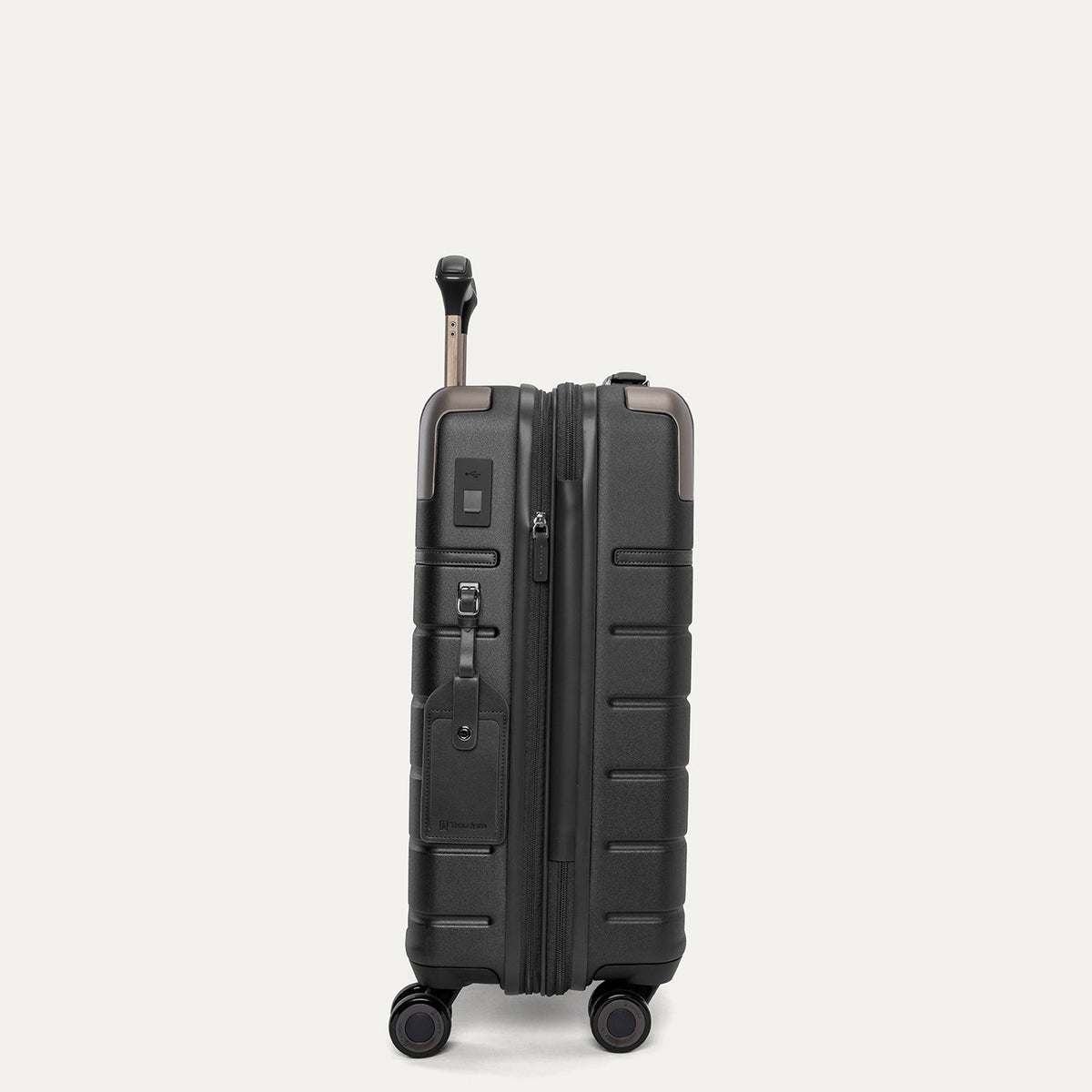 Side profile of the Travelpro Platinum Reserve Compact Cabin Hardshell Spinner in Black Dust