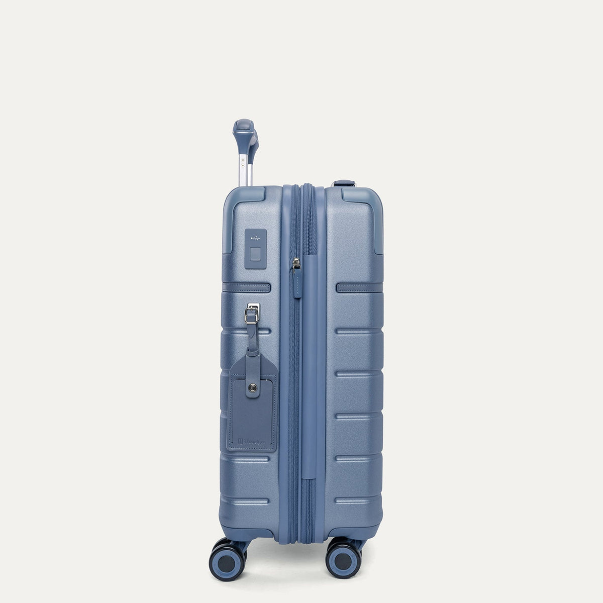 Side profile of the Travelpro Platinum Reserve Compact Cabin Hardshell Spinner in Steel Blue