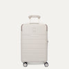 Front view of the Travelpro Platinum Reserve Compact Cabin Hardshell Spinner in Sandstone