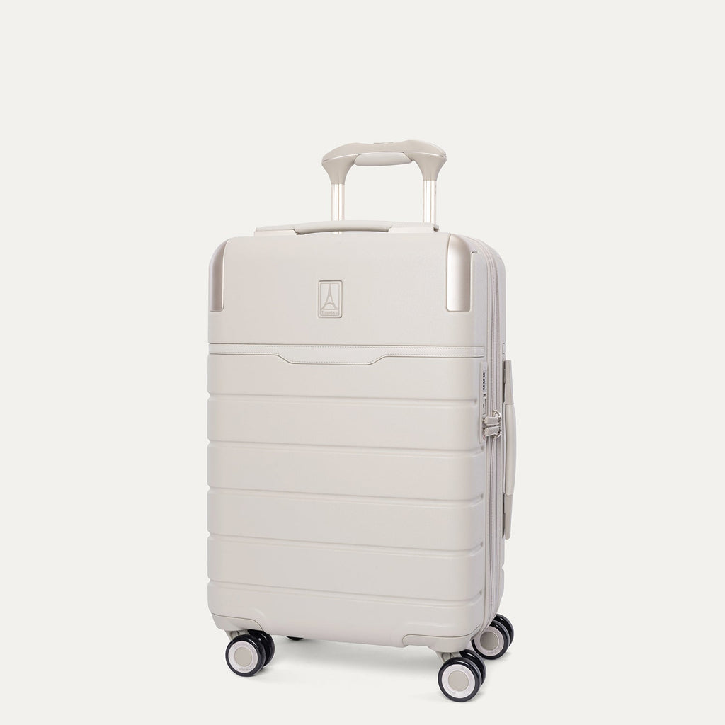 Three-quarter angled view of the Travelpro Platinum Reserve Compact Cabin Hardshell Spinner in Sandstone
