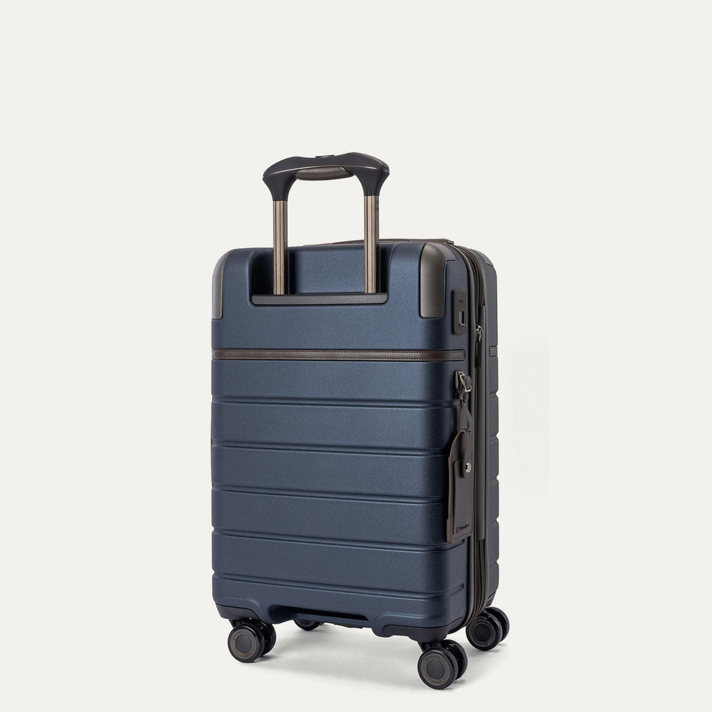 Rear angled view of the Travelpro Platinum Reserve Compact Cabin Hardshell Spinner in Midnight Trail