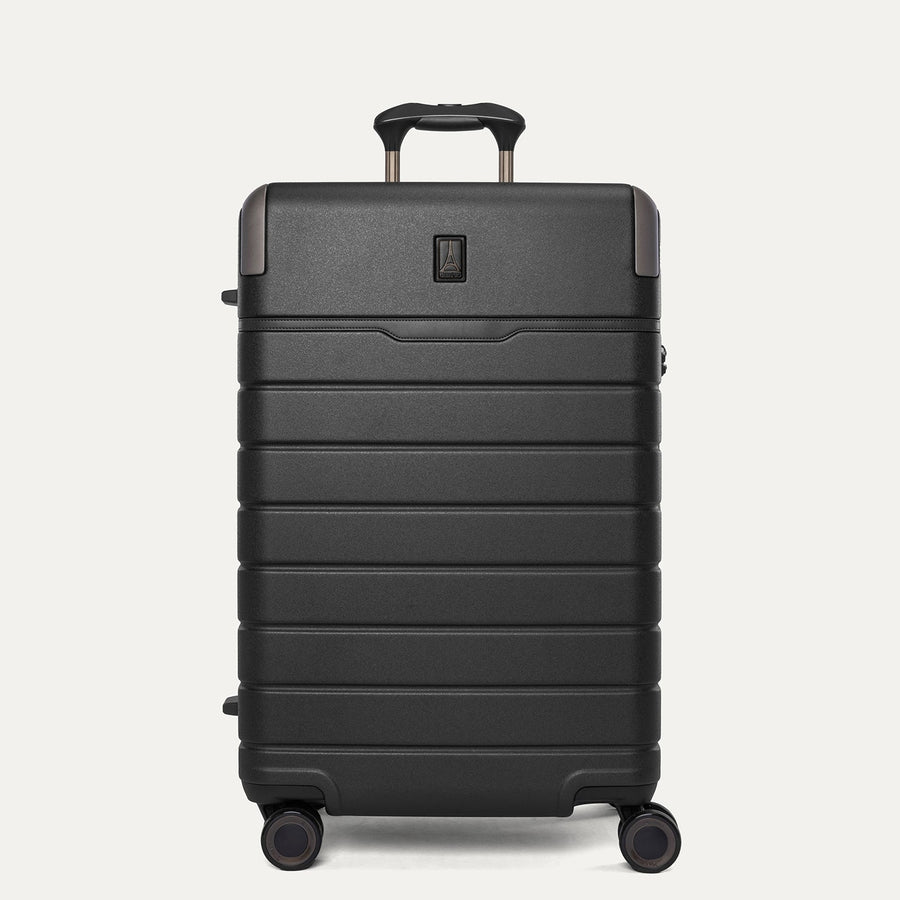 Front view of the Travelpro Platinum Reserve Medium Check-In Hardshell Spinner in Black Dust