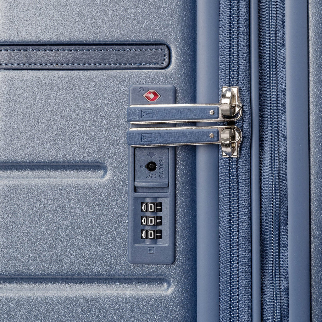 Close-up of the built-in TSA lock on the Travelpro Platinum Reserve Medium Check-In Hardshell Spinner in Steel Blue
