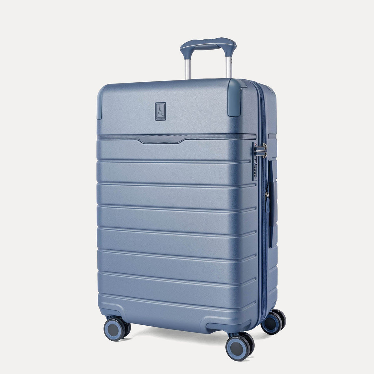 Three-quarter angled view of the Travelpro Platinum Reserve Medium Check-In Hardshell Spinner in Steel Blue