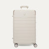 Front view of the Travelpro Platinum Reserve Medium Check-In Hardshell Spinner in Sandstone