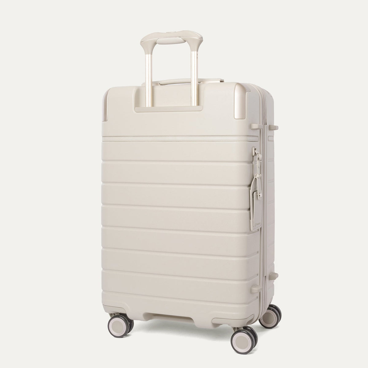 Rear angled view of the Travelpro Platinum Reserve Medium Check-In Hardshell Spinner in Sandstone