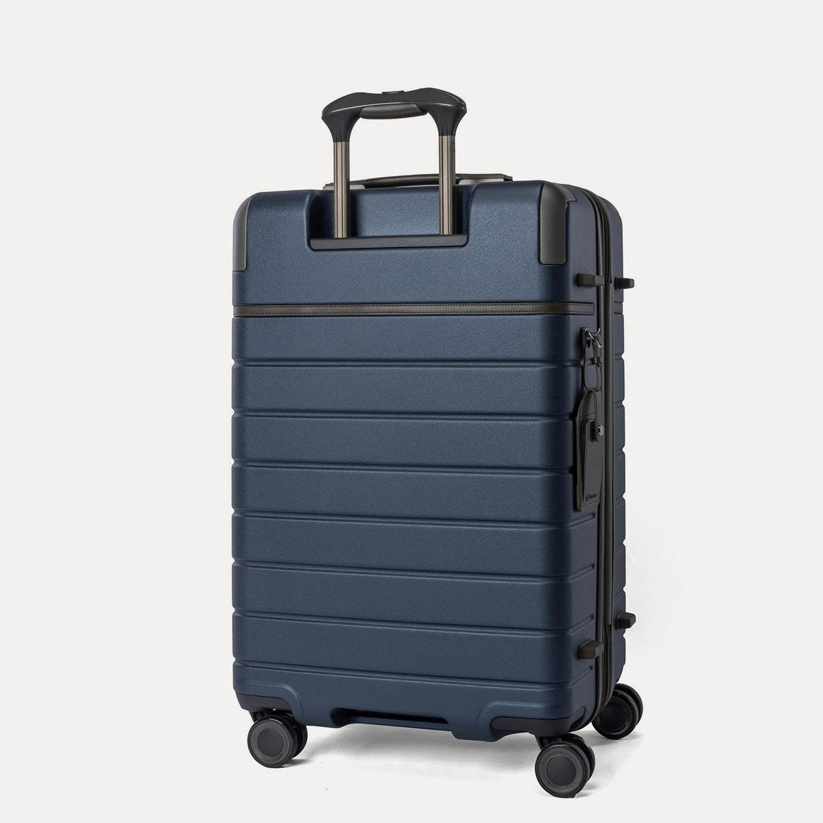 Rear angled view of the Travelpro Platinum Reserve Medium Check-In Hardshell Spinner in Midnight Trail