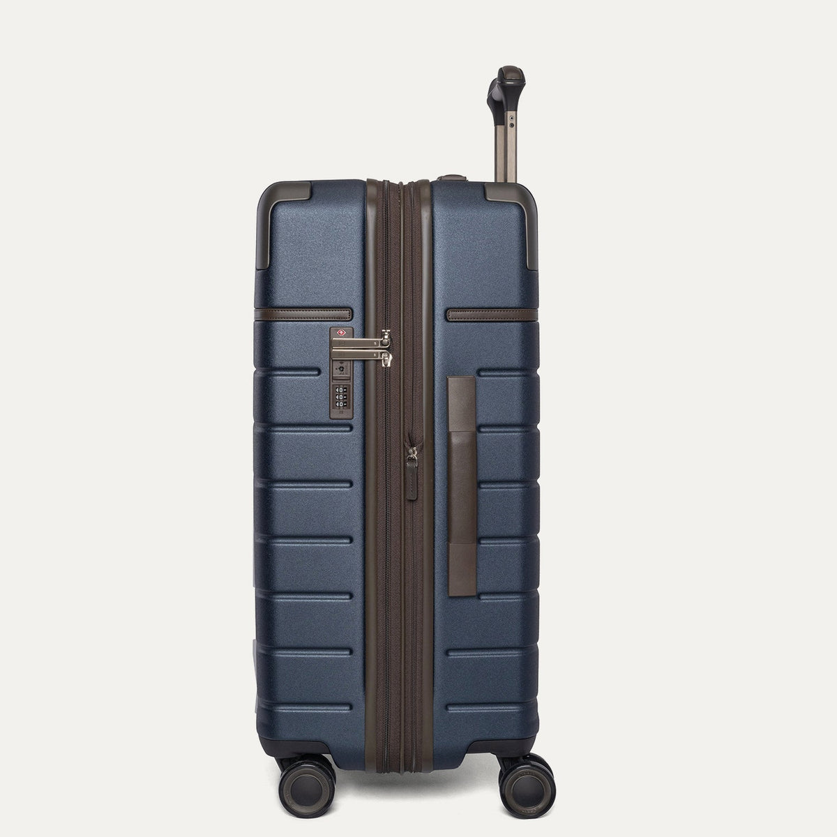 Side profile of the Travelpro Platinum Reserve Medium Check-In Hardshell Spinner in Midnight Trail