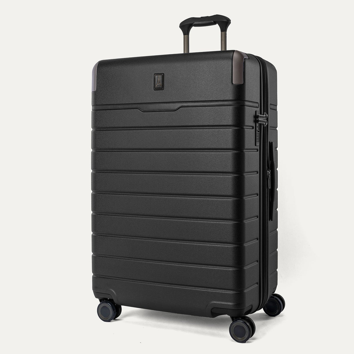 Three-quarter angled view of the Travelpro Platinum Reserve Large Check-In Hardshell Spinner in Black Dust