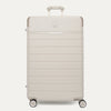 Front view of the Travelpro Platinum Reserve Large Check-In Hardshell Spinner in Sandstone