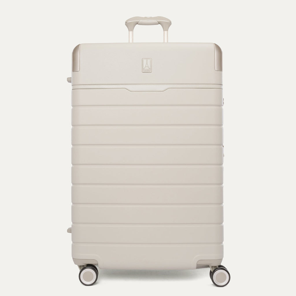 Front view of the Travelpro Platinum Reserve Large Check-In Hardshell Spinner in Sandstone