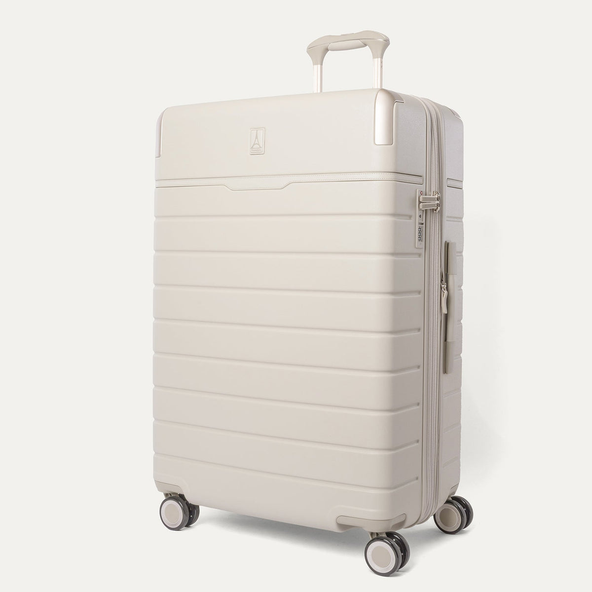 Three-quarter angled view of the Travelpro Platinum Reserve Large Check-In Hardshell Spinner in Sandstone