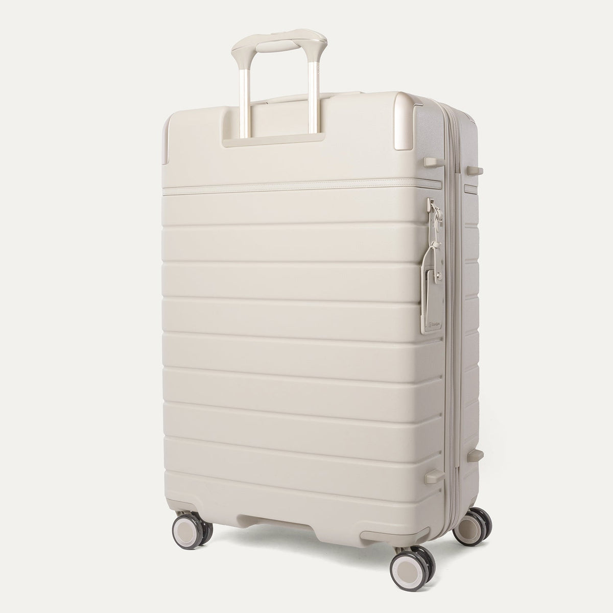 Rear angled view of the Travelpro Platinum Reserve Large Check-In Hardshell Spinner in Sandstone