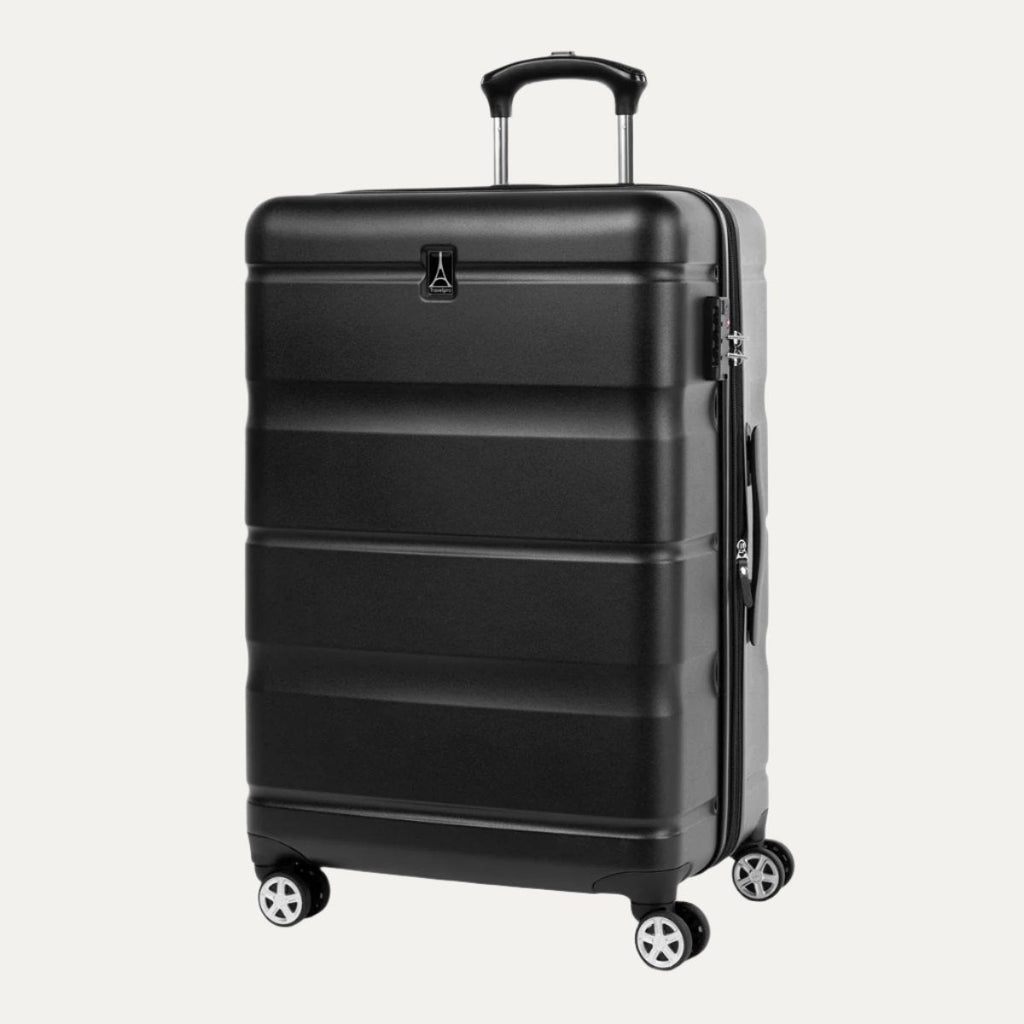 Black hardside spinner suitcase shown at a slight angle, featuring a textured horizontal panel design, four dual spinner wheels, an extended telescopic handle, and a side carry handle.
