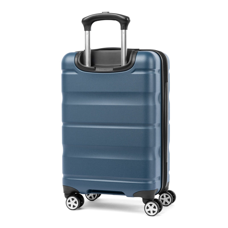 Slanted rear view of Travelpro Runway carry-on hardside spinner in teal blue with telescoping handle and four 360° wheels.