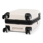 Bottom view of white hardside spinner with four 360° wheels and protective corner design.
