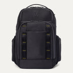 front view of the Travelpro Altitude Large Backpack in Neon Shadow, showing black textured exterior with neon yellow stitching accents, multiple zippered compartments, and side pocket against a light background.