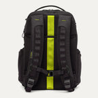 Rear view of the Travelpro Altitude Large Backpack in Neon Shadow, showing padded shoulder straps, black textured exterior, and bright neon yellow center panel against a light background.