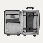 Open suitcase with interior organization panels on a white background