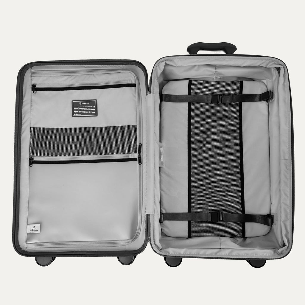 Open suitcase with interior organization panels on a white background