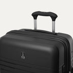 Black suitcase with a visible brand logo on a white background