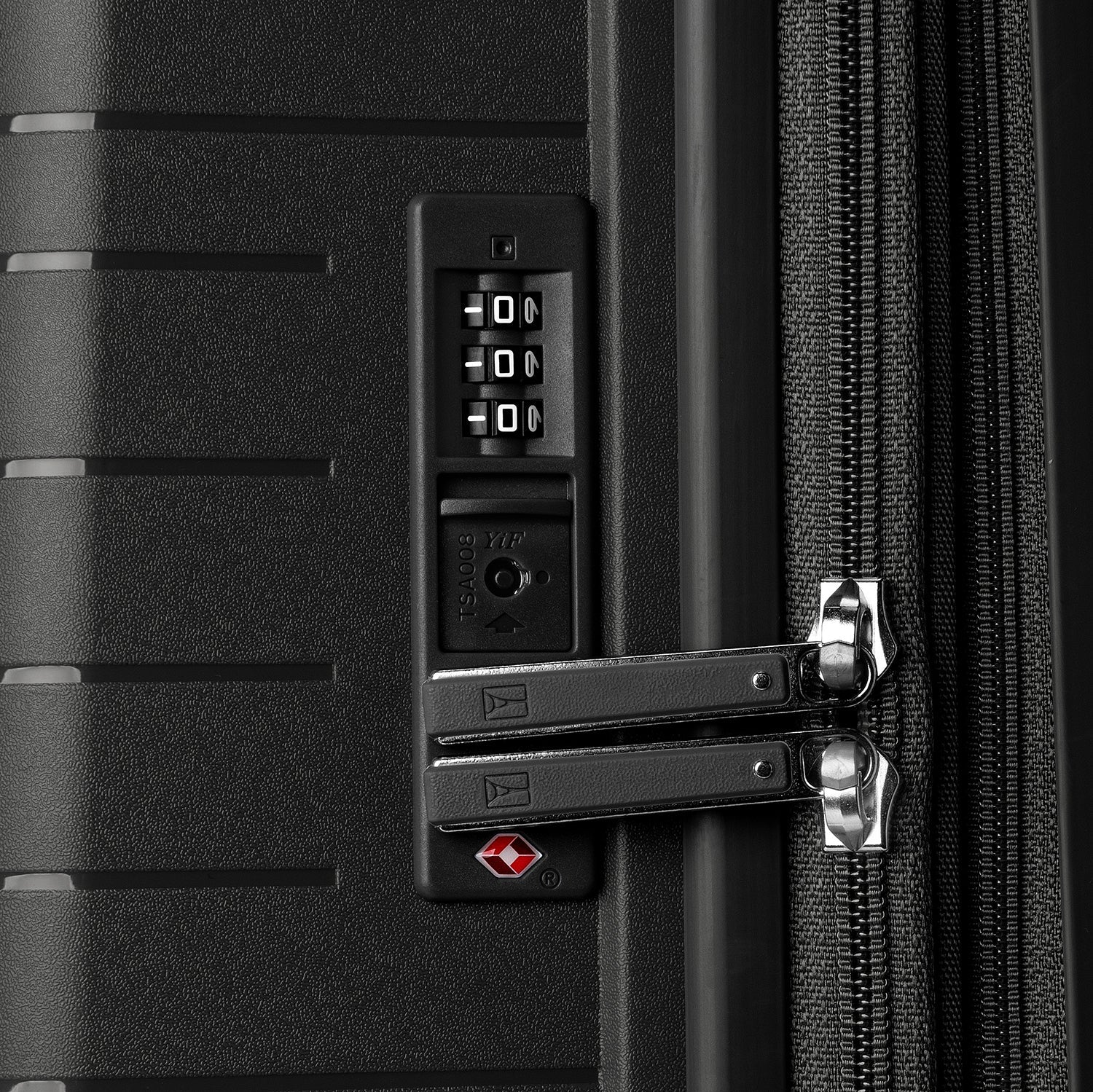 Close-up of a black suitcase with a combination lock and TSA lock.
