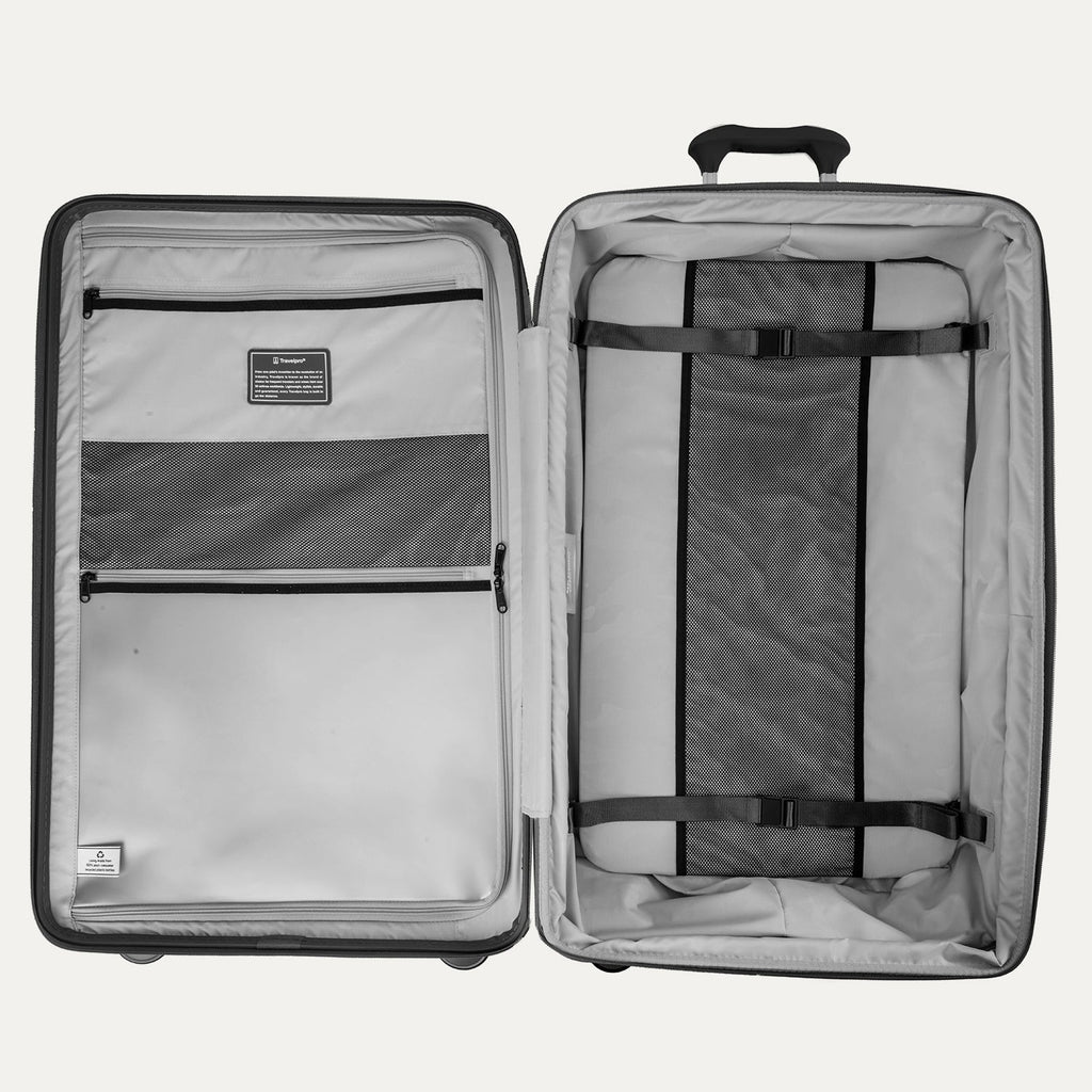 Open gray suitcase with interior organization panels on a white background