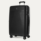 Black suitcase with a ribbed texture on a white background