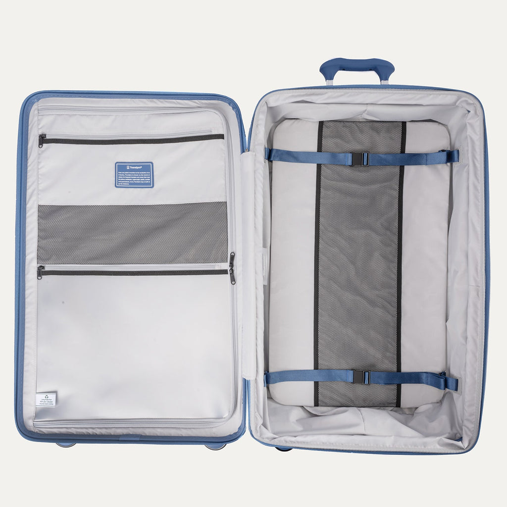 Open suitcase with interior organization panels on a white background