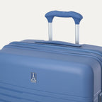 Blue suitcase with a visible brand logo on a light gray background