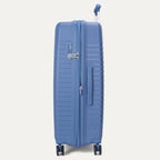 Blue suitcase on a light gray background