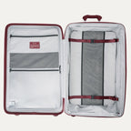 Open suitcase with interior organization panels and straps on a white background